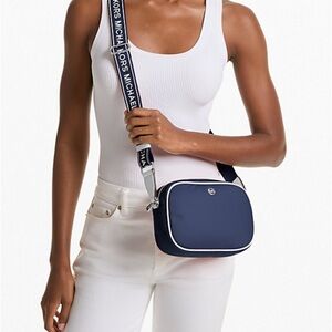 MICHAEL KORS Zip travel jet medium oval camera Crossbody Bag navy blue new